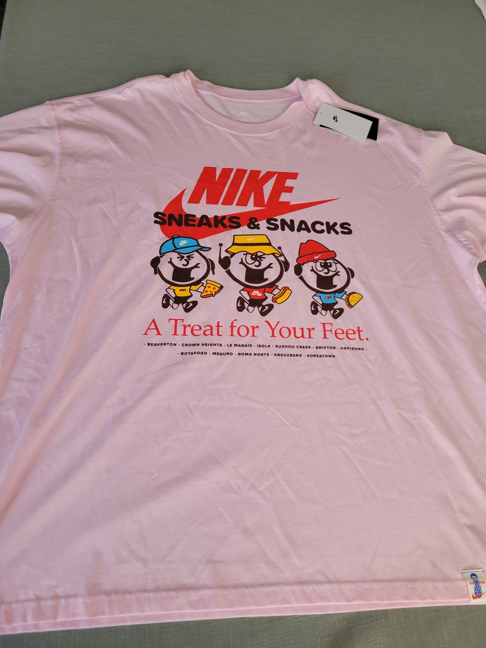Nike Pink 'Sneaks & Snacks' Graphic Short Sleeve Tee
